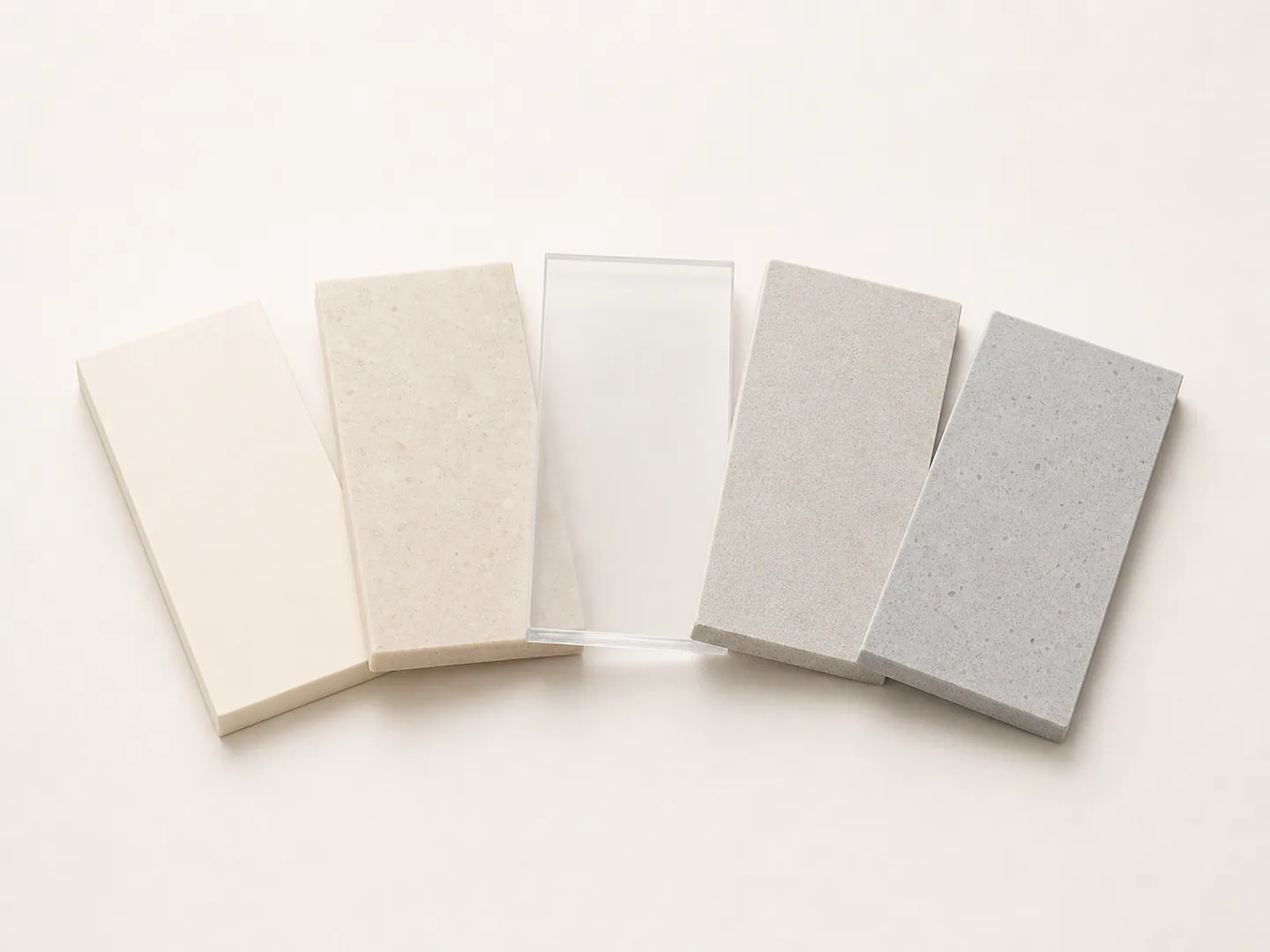 Illustrative unbranded neutral material swatches for a packaging-finish discussion; final finish selection requires project confirmation.