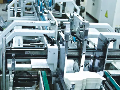 box gluing production equipment inside the packaging factory