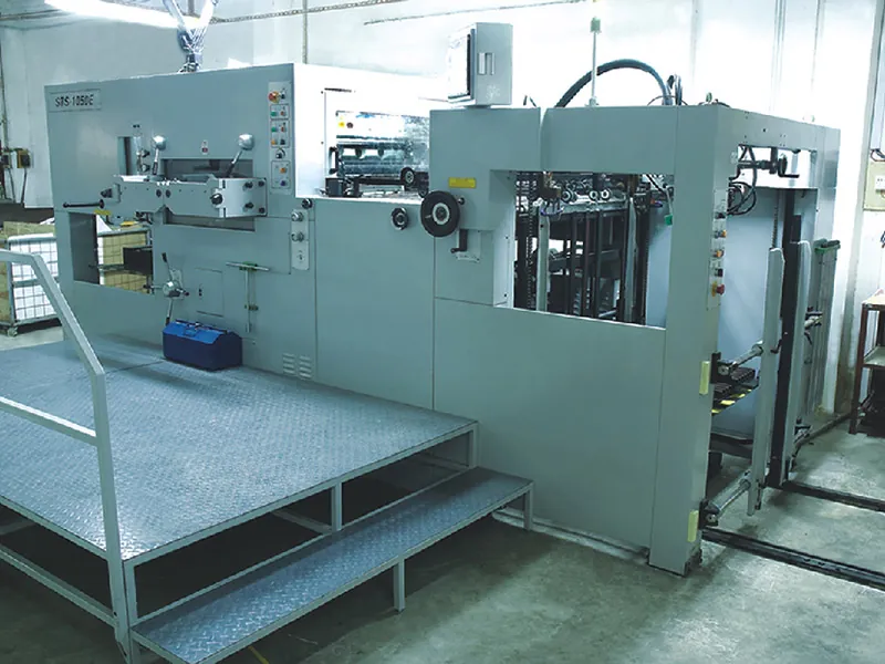 automatic die-cutting equipment inside the packaging factory
